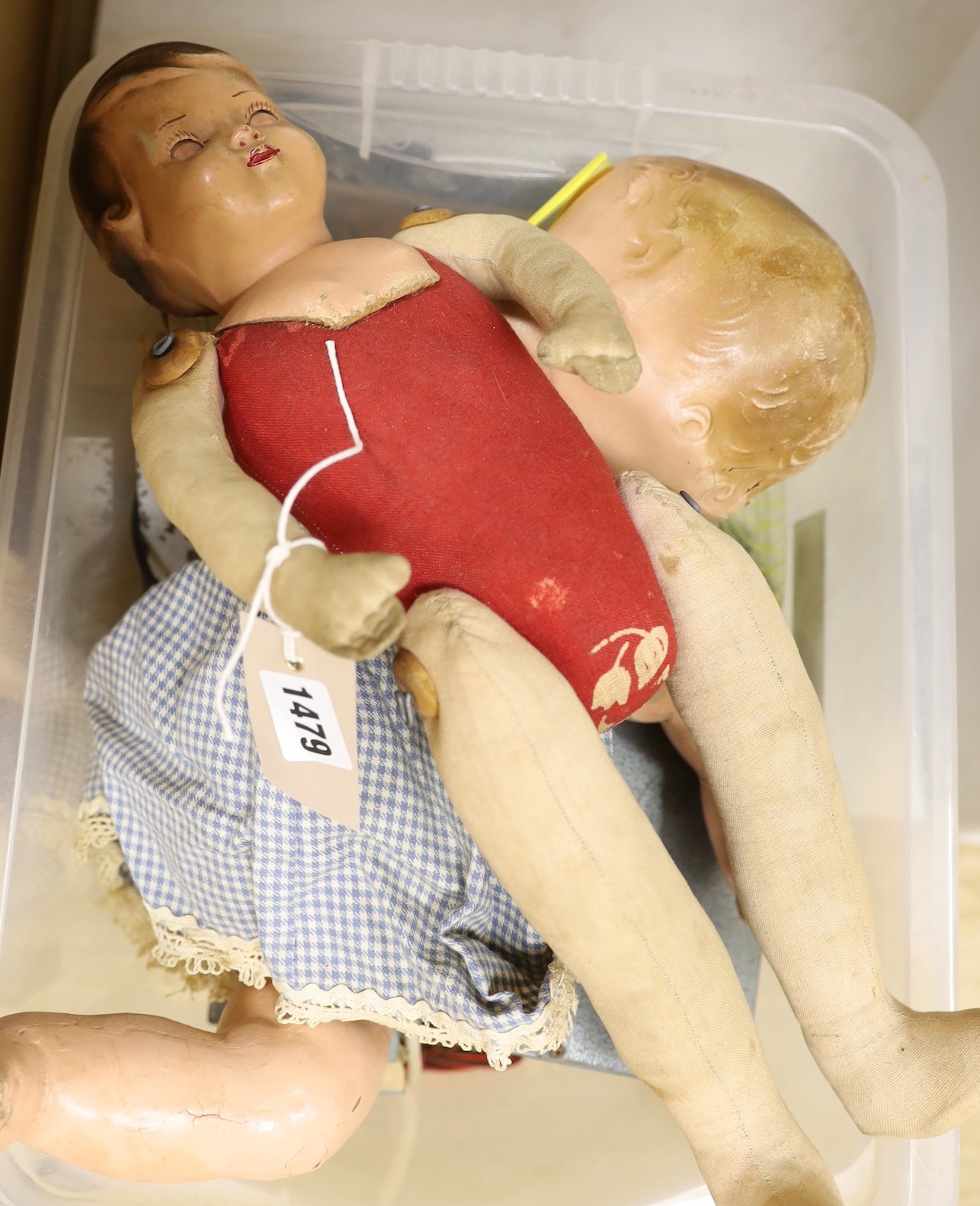 An assortment of miscellaneous boxed toys, two dolls etc
